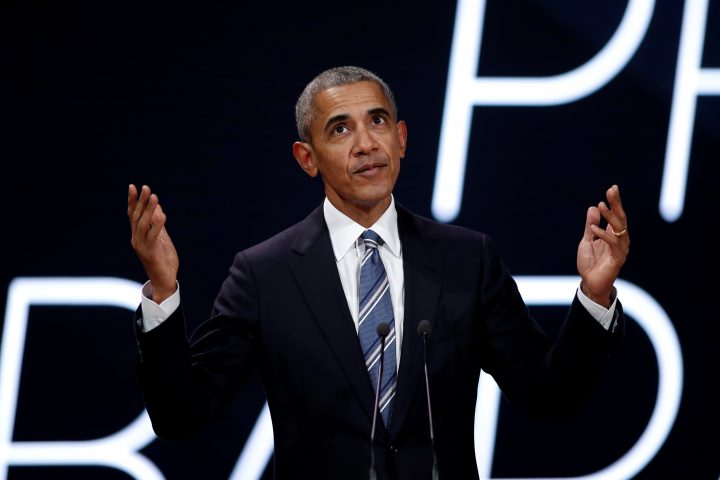 Former U.S. president Barack Obama speaks at a conference during his first visit to France since he left the White House, on Dec. 2, 2017. 