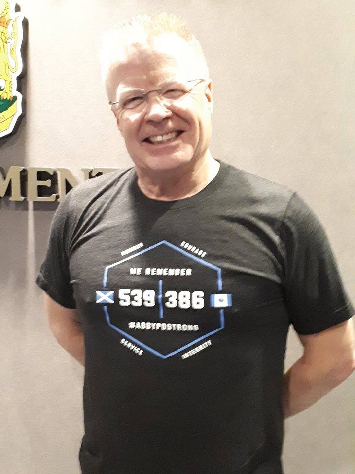 Abbotsford Police Chief Bob Rich wearing a John Davidson T-shirt.