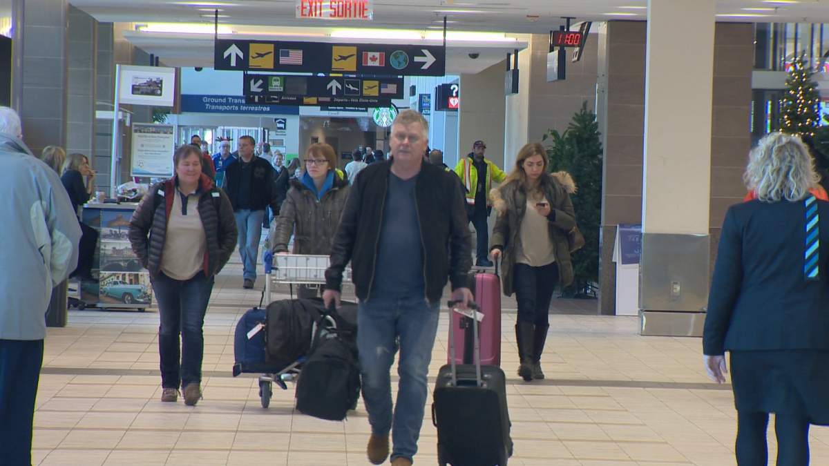 Officials are encouraging everyone to check their flights before heading to the airport and to leave ample time to get through security this holiday weekend.