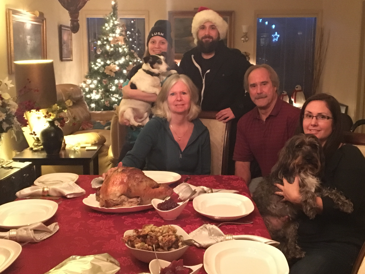 Jennifer Turner with her fiance's family, ready to eat a Christmas turkey that was given to them at the last minute.