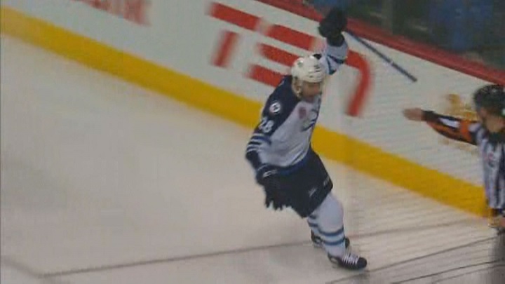 Manitoba Moose captain Patrice Cormier celebrates his second goal of the game in their 6-1 win over the Milwaukee Admirals on Sunday.