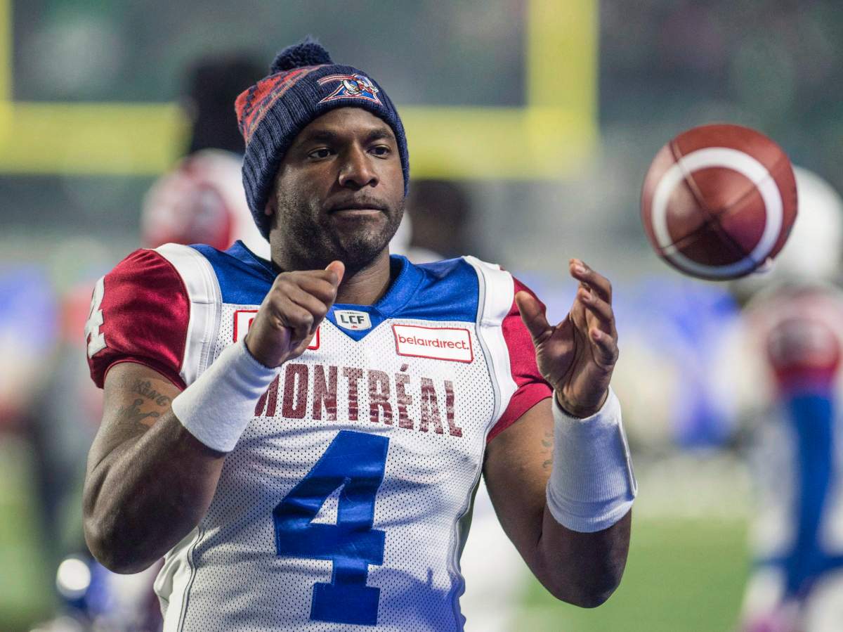 Montreal Alouettes quarterback Darian Durant warms up on the sidelines before taking to the field ahead of first half CFL football action against the Saskatchewan Roughriders in Regina on Friday, October 27, 2017. THE CANADIAN PRESS/Rick Elvin