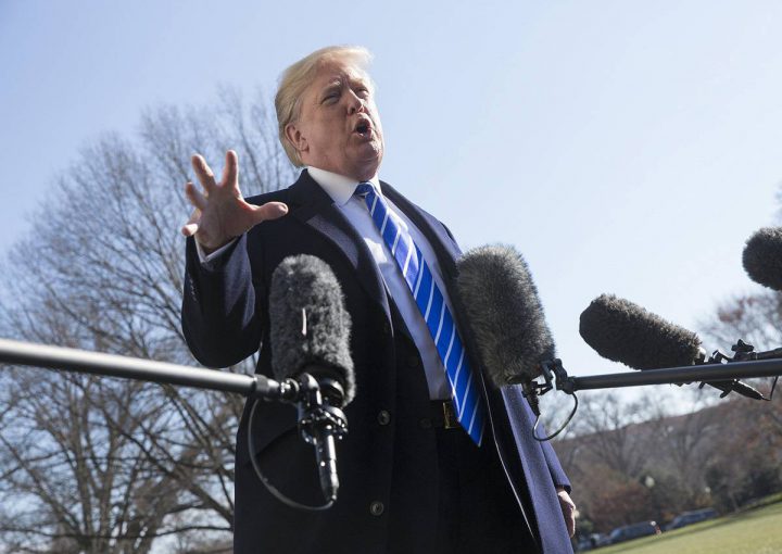 Donald J. Trump  speaks to the media as he departs the White House in Washington.