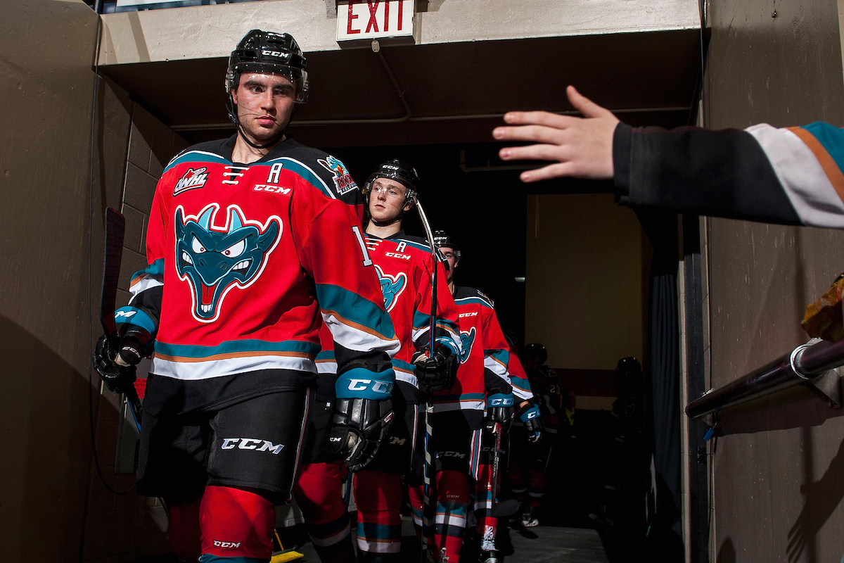 KELOWNA, CANADA - OCTOBER 13: Dillon Dube #19 of the Kelowna Rockets leads the team through the tunnel to the ice against the Calgary Hitmen on October 13, 2017 at Prospera Place in Kelowna, British Columbia, Canada.  (Photo by Marissa Baecker/Shoot the Breeze)  *** Local Caption ***.