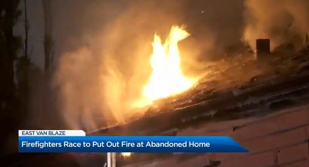 Flames were shooting out of the roof when firefighters arrived.