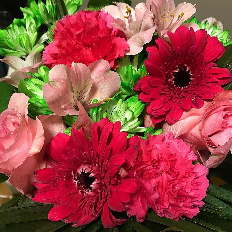These flowers were given to Cari Bentham when she was shopping. 