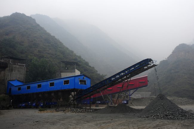 Ore is piled up for delivery at a mine owned by Silvercorp Metals Inc. in Jiyuan, Henan Province, China, Sept. 27, 2011. 


