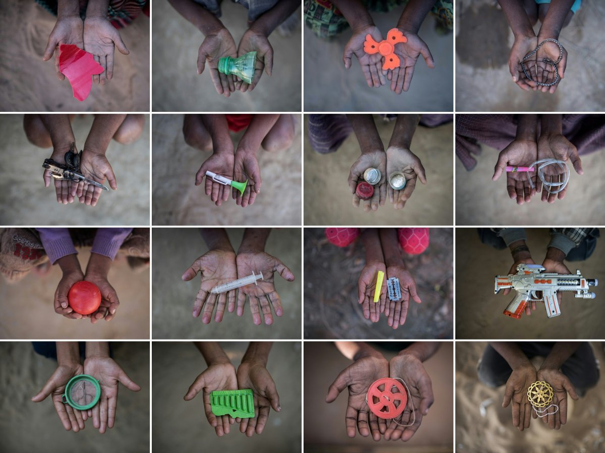 This combination of pictures created on December 3, 2017 shows Rohingya children holding objects they use as toys to play with in refugee camps in Bangladesh's Cox's Bazar.
