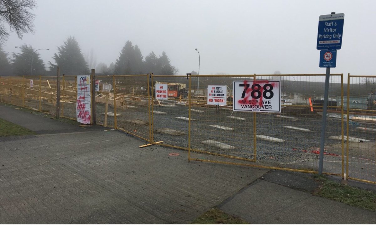 Racist graffiti appeared on construction signs at the site of a future temporary modular housing project in Marpole on December 8, 2017. 