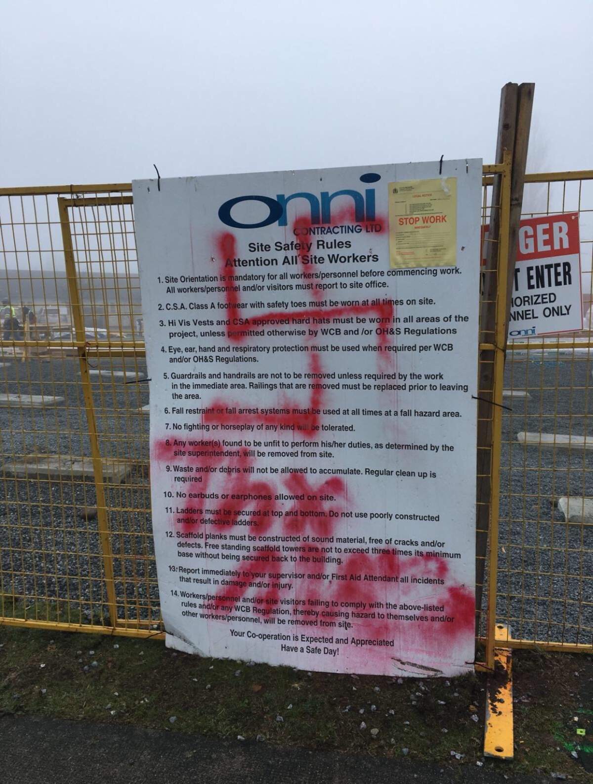 Racist graffiti appeared on construction signs at the site of a future temporary modular housing project in Marpole on December 8, 2017.