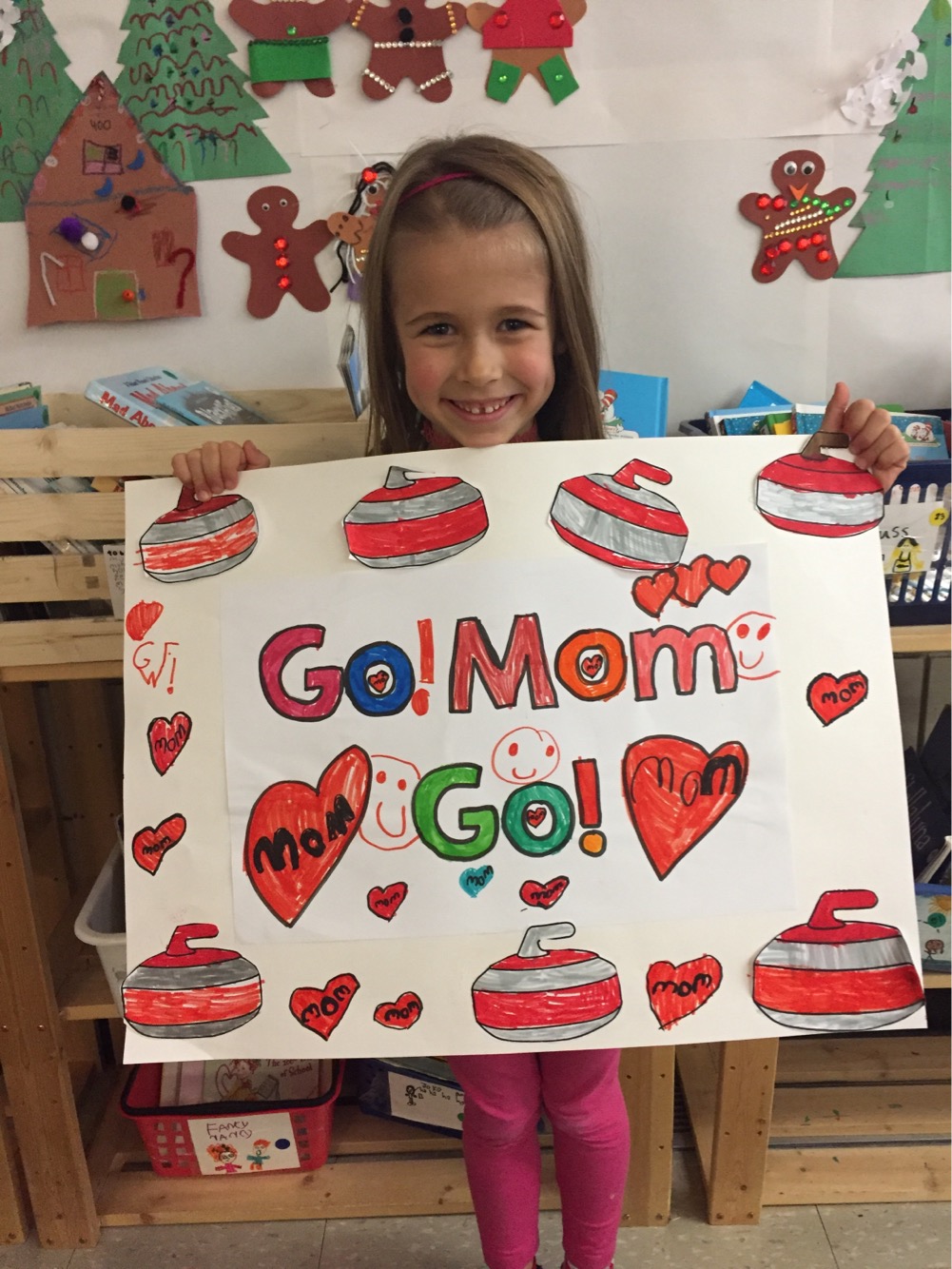 Camryn made a sign to cheer the team at the Olympic Trials