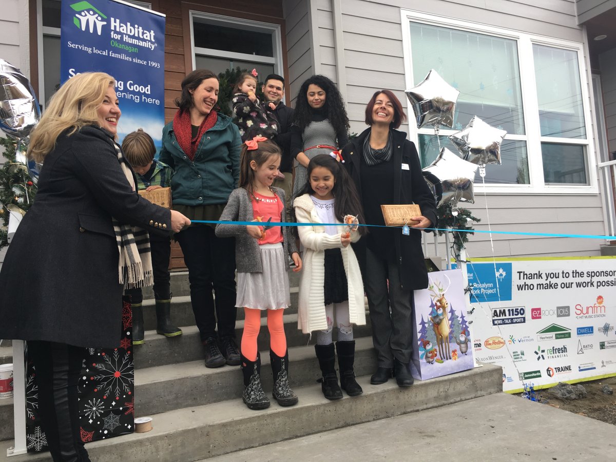 Three Vernon families officially get keys to new homes thanks to Habitat for Humanity. 