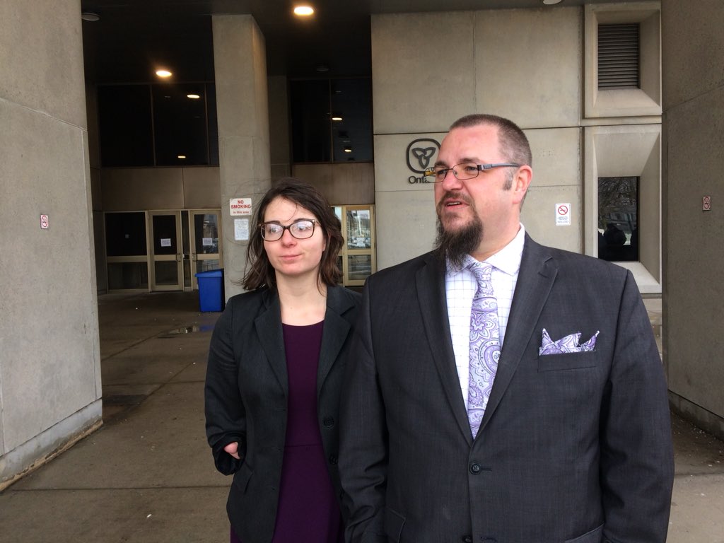 Brittany Boyce's defence lawyer, Jim Dean, stands outside the courthouse with his associate Megan Stuckey.