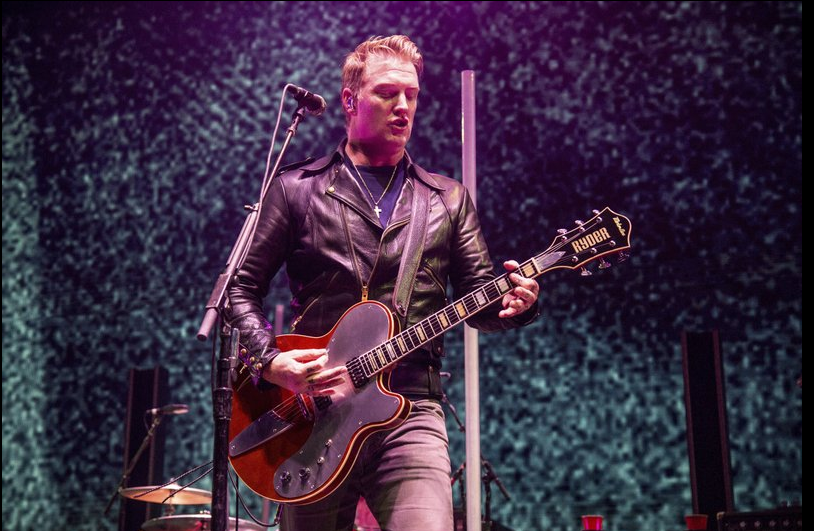 Josh Homme of Queens of the Stone Age performs at the 2017 KROQ Almost Acoustic Christmas at The Forum on Saturday, Dec. 9, 2017, Inglewood Calif. 