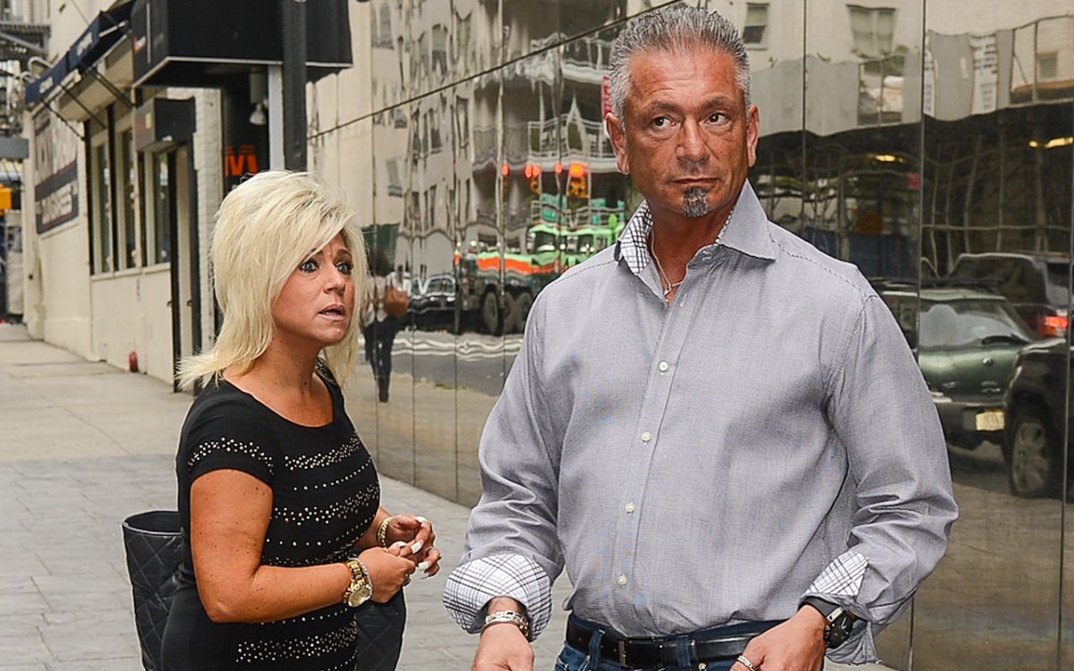 TV personalities Theresa Caputo (L) and Larry Caputo leave the 'Good Day New York' taping at the Fox 5 Studios on Sept. 6, 2012 in New York City. 