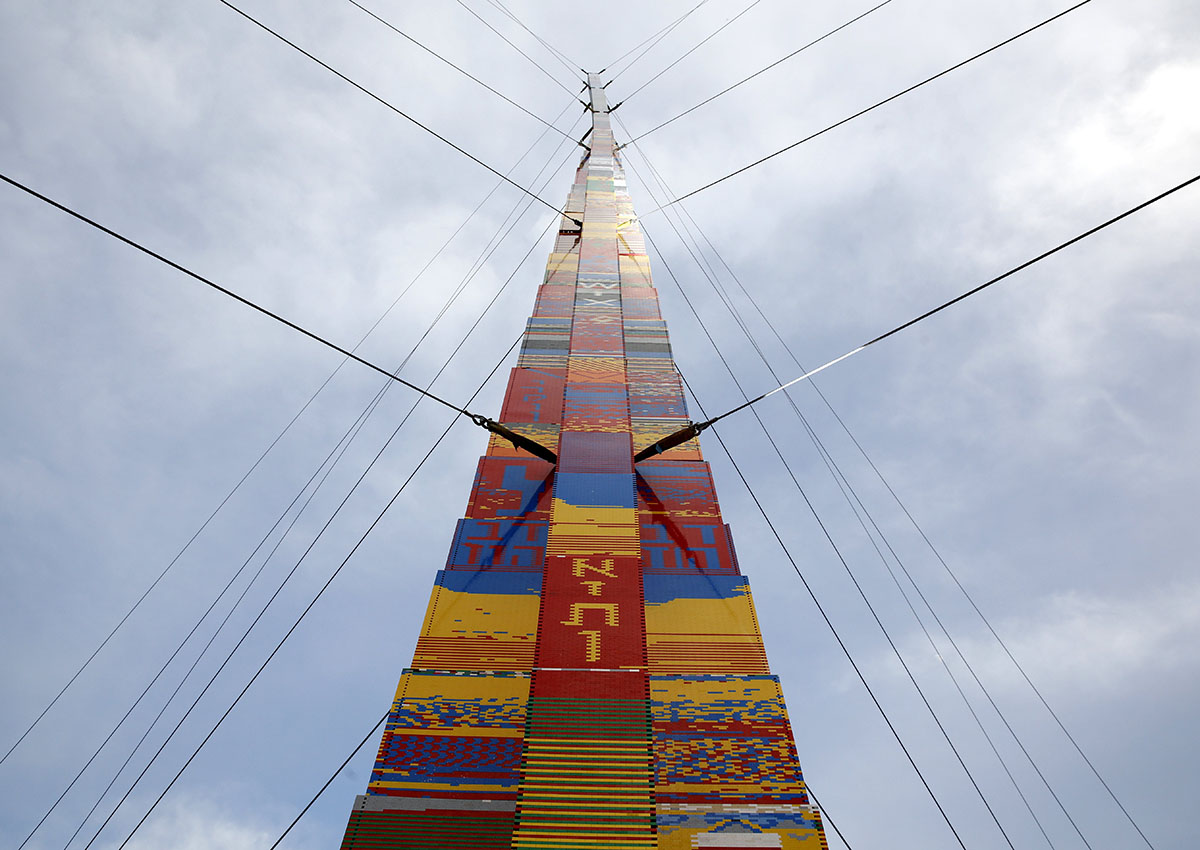 Workers build a Lego Tower at Rabin Square in Tel Aviv.