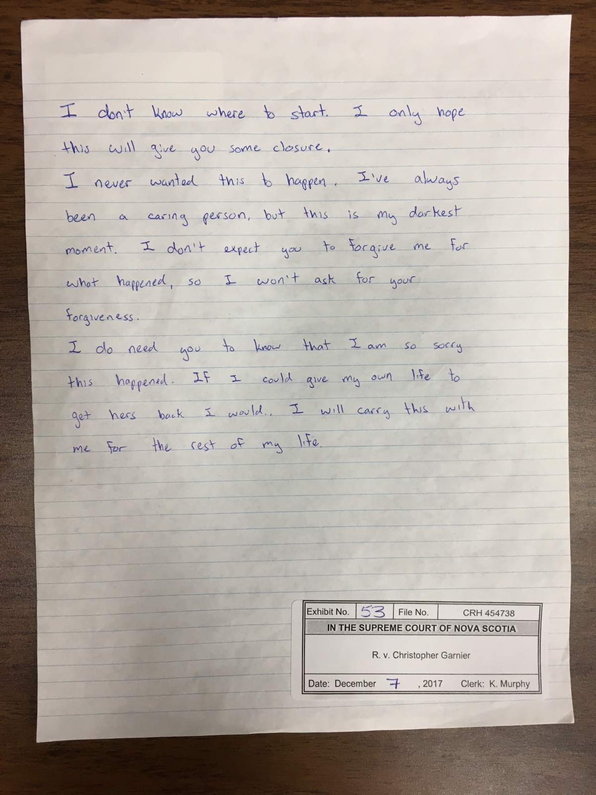 A handwritten note prepared by Christopher Garnier during his police interrogation.