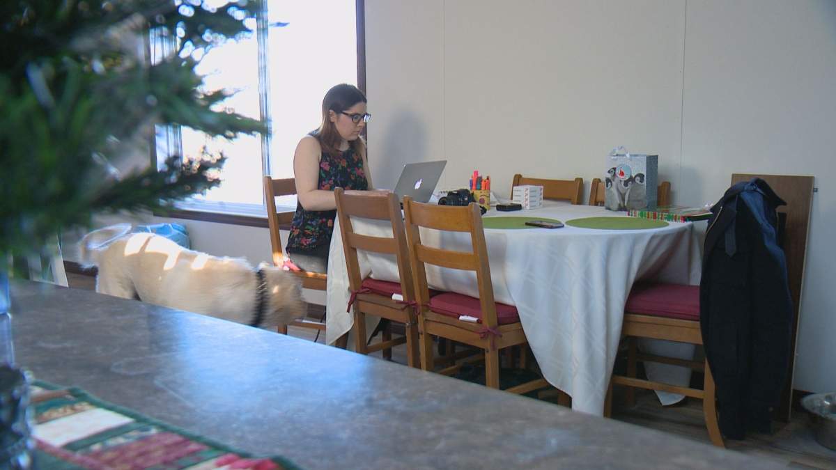 Robyn Tocker works on a story for the Waterfront Regional Star at her home office.