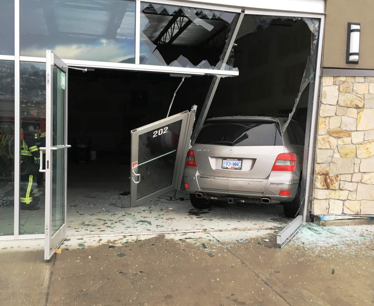 Vehicle plows into West Kelowna building - image