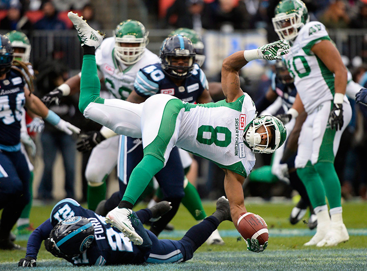Toronto Argonauts defensive back Qudarius Ford tackles Saskatchewan Roughriders wide receiver Marcus Thigpen during first half of the East Division final in Toronto, Sunday, November 19, 2017. Thigpen has been suspended for two games for violating the CFL’s drug policy.