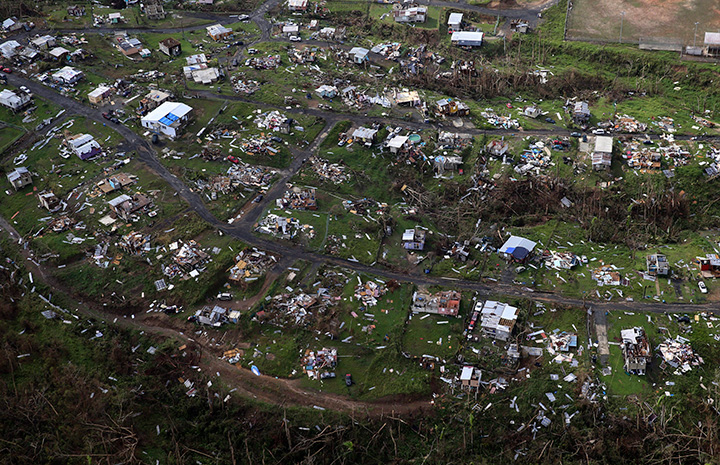 Homes and other buildings destroyed by Hurricane Maria lie in ruins in Toa Alta, Puerto Rico, on Sept. 28, 2017. 