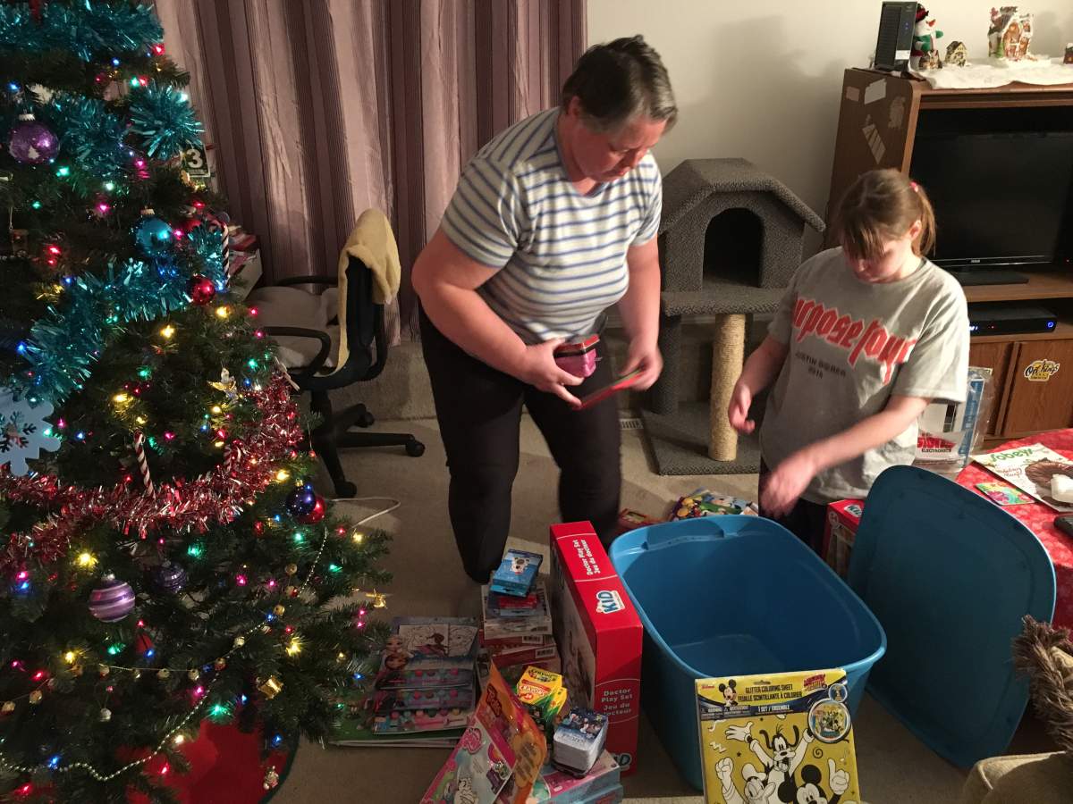This mother daughter duo already have a full container of toys to donate.