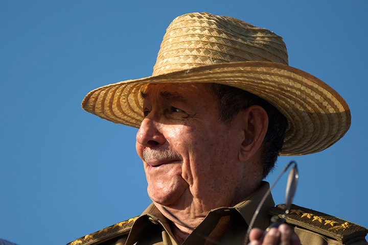 In this May 1, 2017 file photo, Cuba's President Raul Castro watches the Mayday march at Revolution Square in Havana. 