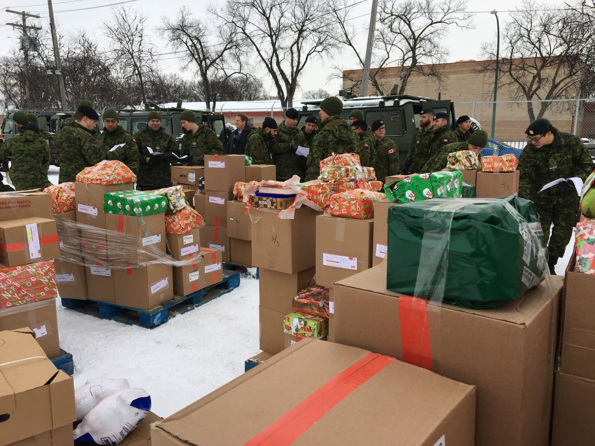 Soldiers donate their free time to Winnipeg's Parcel Push. 