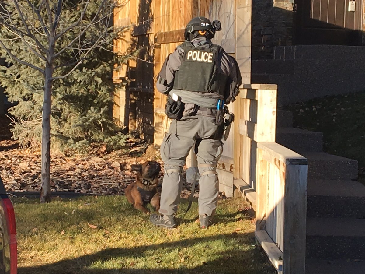 Calgary police surround a southwest home.