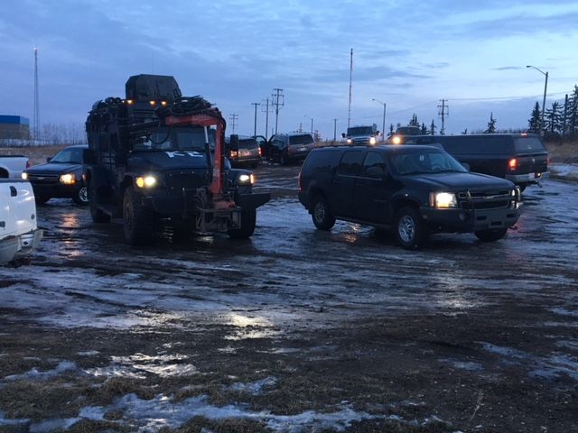 RCMP, including a tactical team, on scene at an industrial park in Sherwood Park, Alta. December 12, 2017.