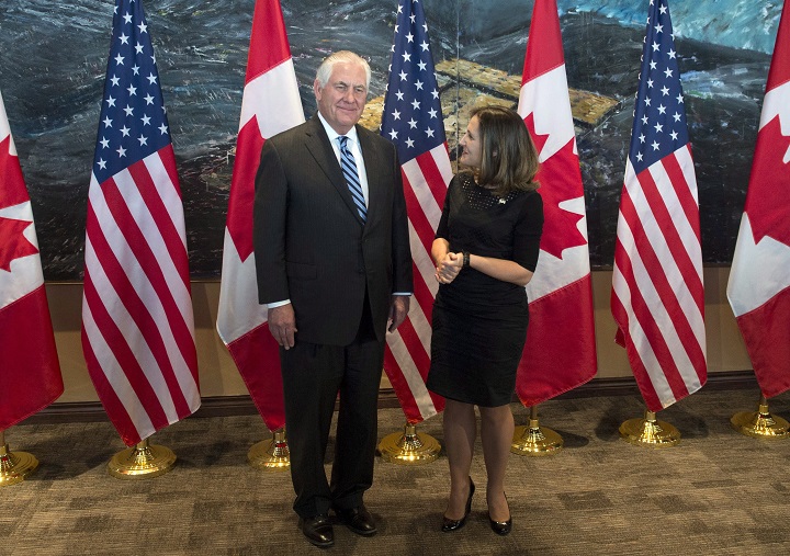 Foreign Affairs Minister Chrystia Freeland speaks with U.S. Secretary of State Rex Tillerson before a meeting in Ottawa, Tuesday December 19, 2017.