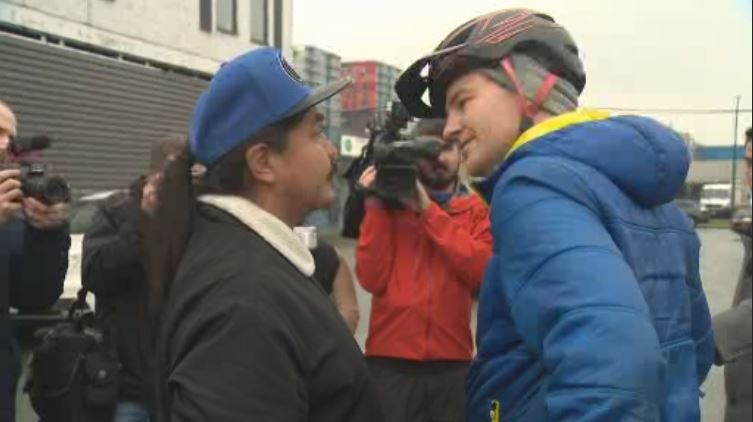 Herb Varley (left) pushed Troy Tyrell (right) when he refused to leave the press conference.