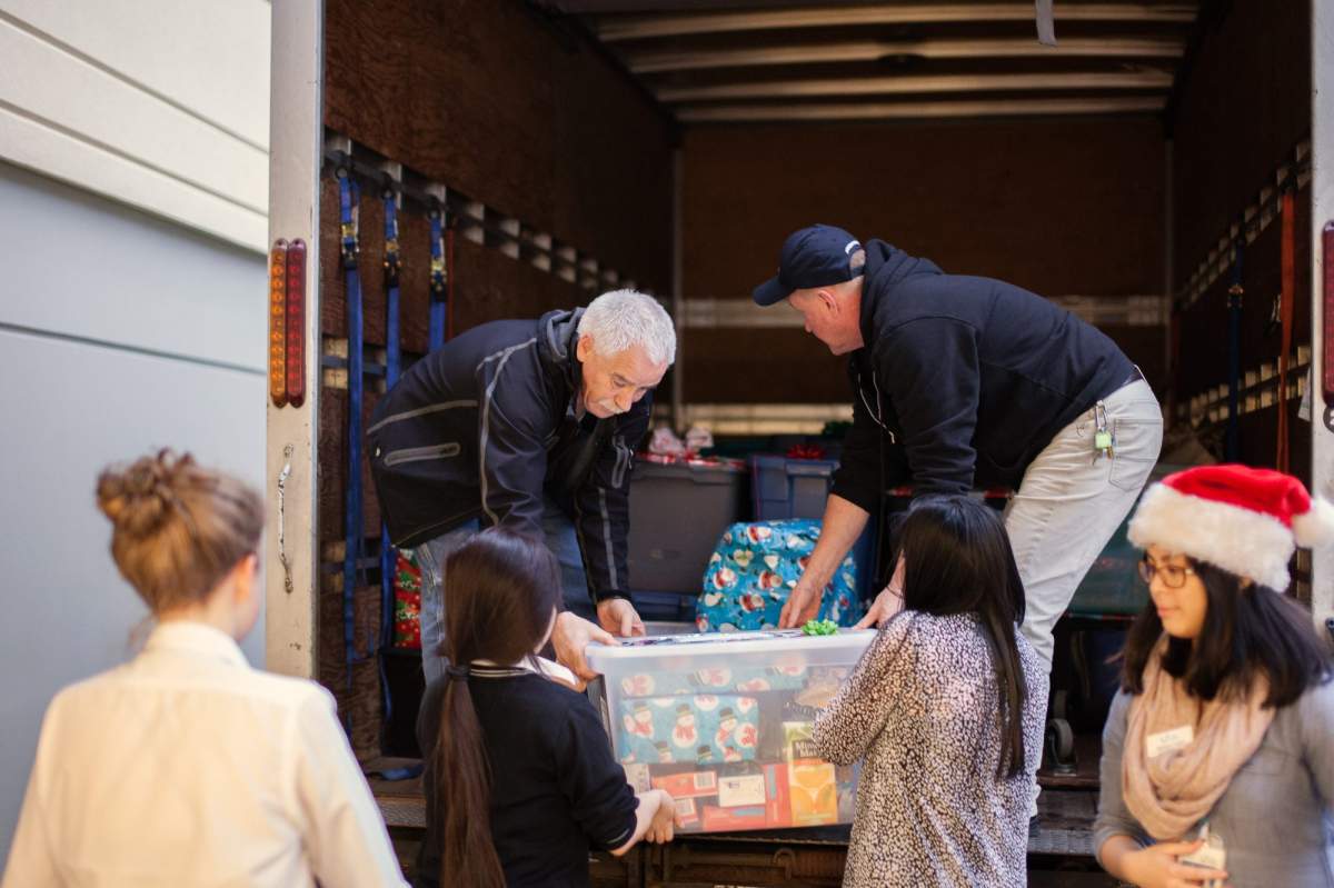 UGM volunteers prepare Christmas hampers.