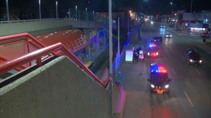 Emergency crews respond to the Victoria Park LRT Station on Thursday, Dec. 7, 2017 after a man fell off a nearby pedestrian overpass onto the CTrain tracks below. 