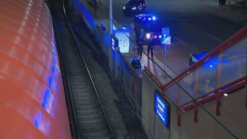 Emergency crews respond to the Victoria Park LRT Station on Thursday, Dec. 7, 2017 after a man fell off a nearby pedestrian overpass onto the CTrain tracks below.