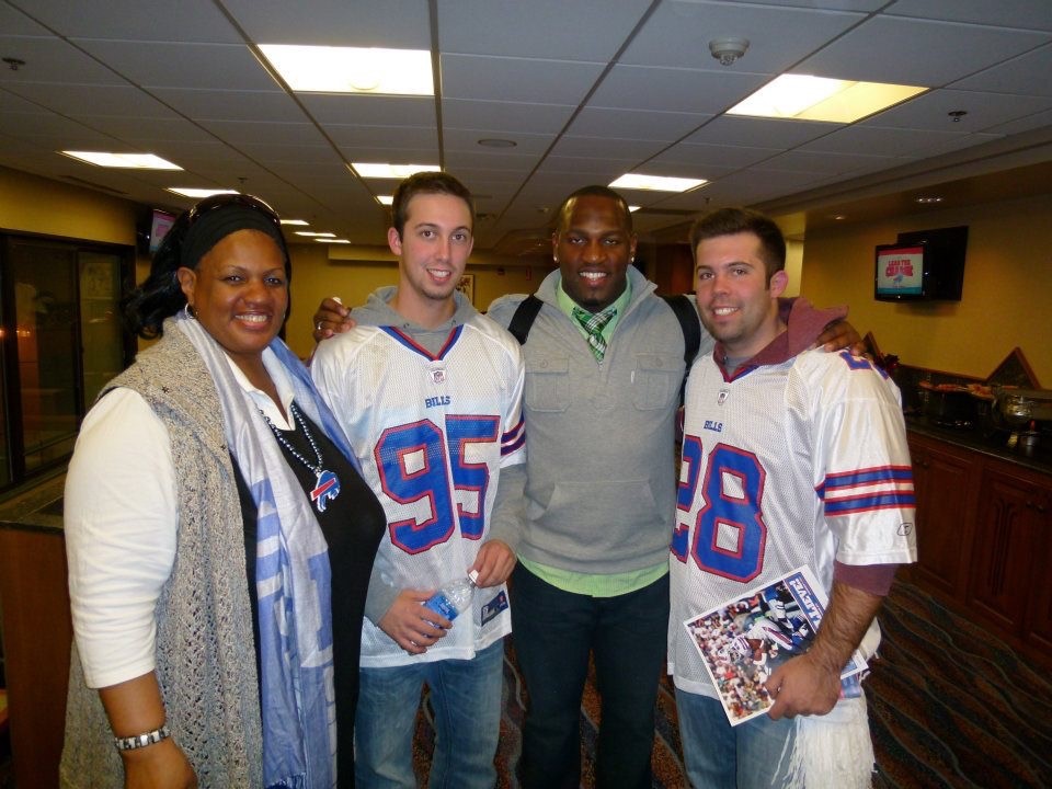 OJ poses for photos with fans in a Buffalo Bills jersey