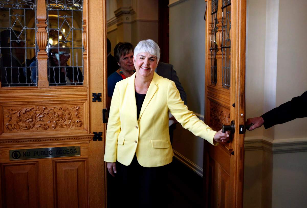B.C. Finance Minister Carole James leaves the legislative assembly after delivering the budget from the legislative assembly at Legislature in Victoria, B.C., on Monday, September 11, 2017.