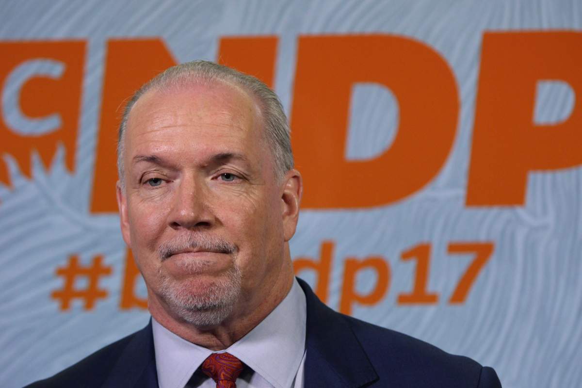 Premier John Horgan speaks to media following his speech to delegates and supporters during the B.C. NDP Convention at the Victoria Conference Centre in Victoria, B.C., on Saturday, November 4, 2017. 