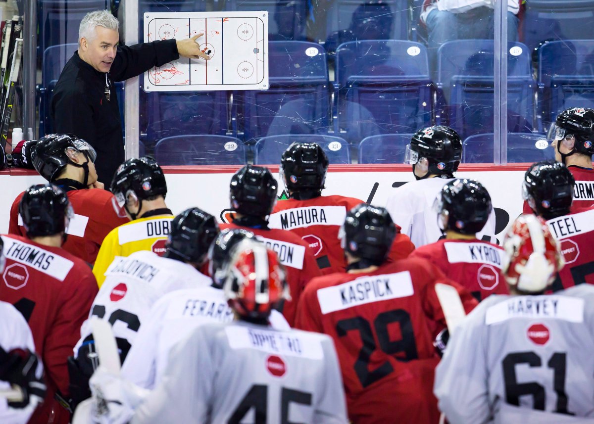 Canadian national junior team head coach Dominique Ducharme outlines a drill on the first day of selection camp for the 2018 World Junior Hockey Championship in St.Catharines, Ont., Tuesday, December 12, 2017. 