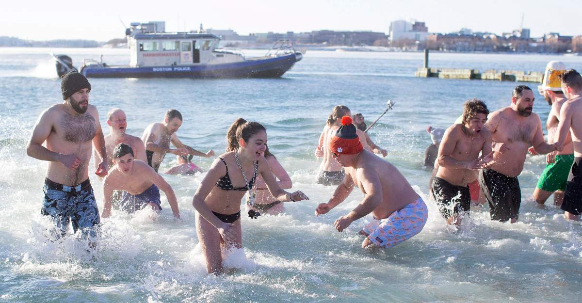 ‘Polar Bear’ swimmers take part in the L Street Brownies New Year’s Day Swim in Dorchester Bay in Boston, Massachusetts, USA, 01 January 2018. EPA/CJ GUNTHER