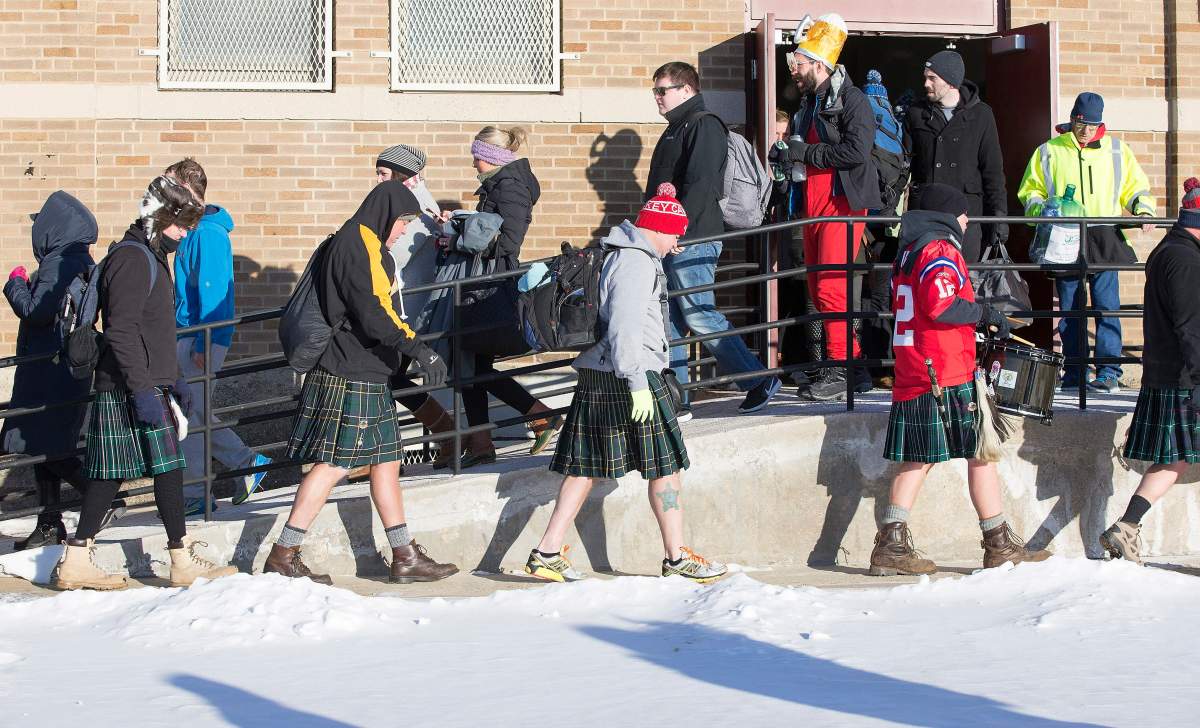 ‘Polar Bear’ swimmers march out of the L Street Bath house as they prepare to take part in the L Street Brownies New Year’s Day Swim in Dorchester Bay in Boston, Massachusetts, USA, 01 January 2018. EPA/CJ GUNTHER