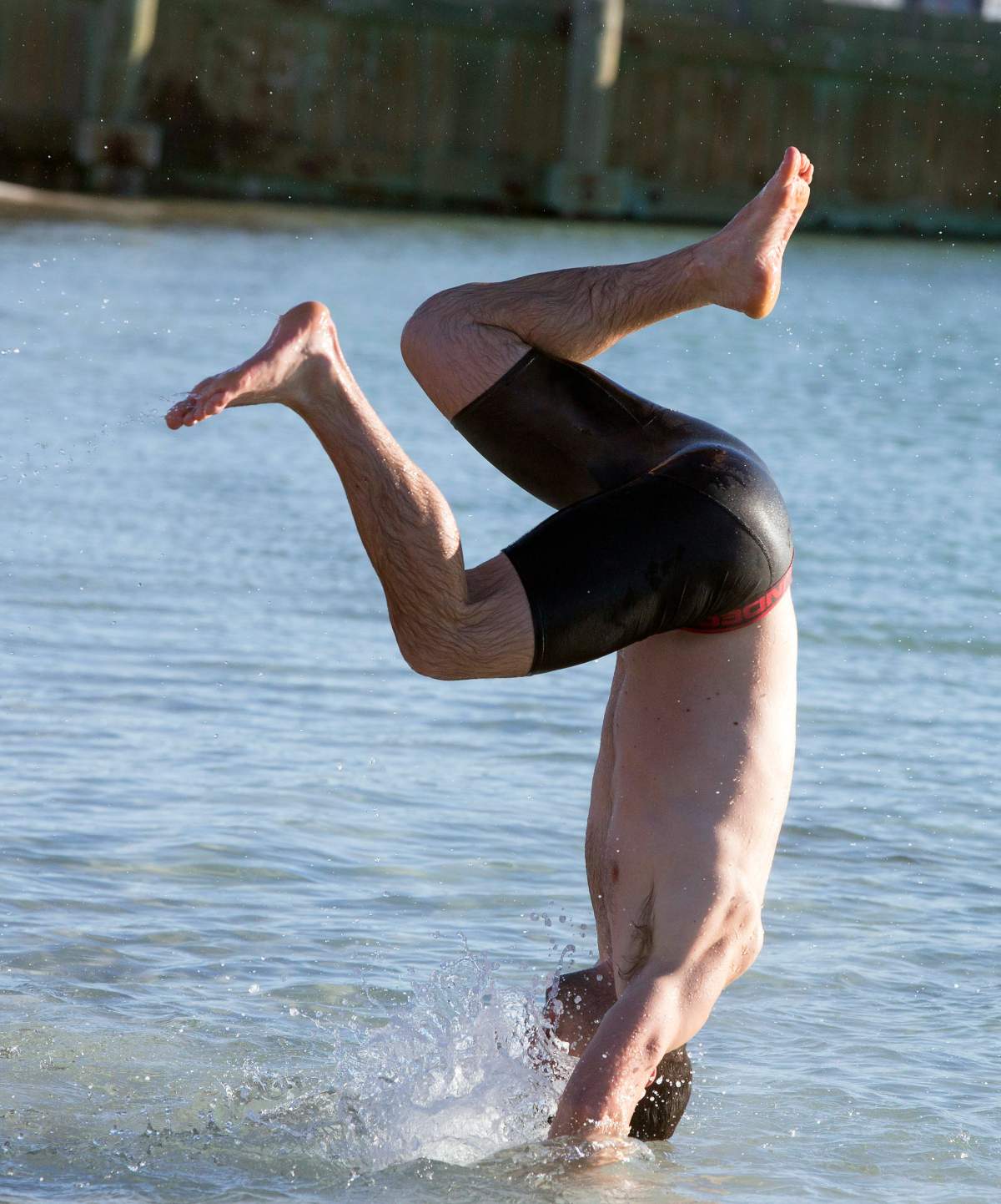 ‘Polar Bear’ swimmers take part in the L Street Brownies New Year’s Day Swim in Dorchester Bay in Boston, Massachusetts, USA, 01 January 2018. . EPA/CJ GUNTHER