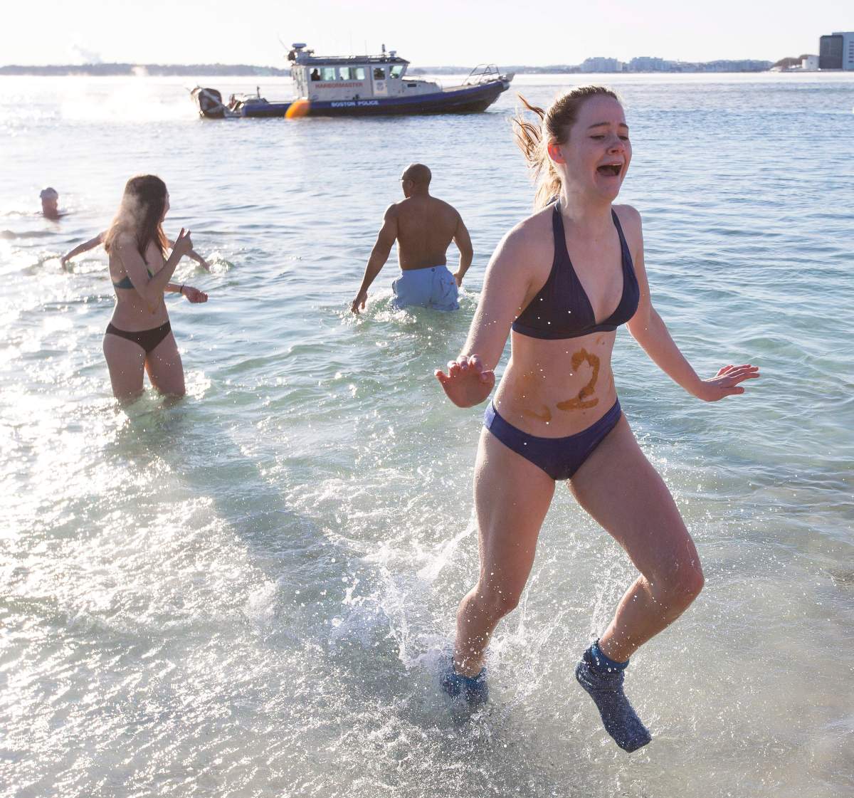 'Polar Bear' swimmers take part in the L Street Brownies New Year's Day Swim in Dorchester Bay in Boston, Massachusetts, USA, 01 January 2018. . 'Polar Bear' swimmers take part in the L Street Brownies New Year's Day Swim in Dorchester Bay in Boston, Massachusetts, USA, 01 January 2018. . 