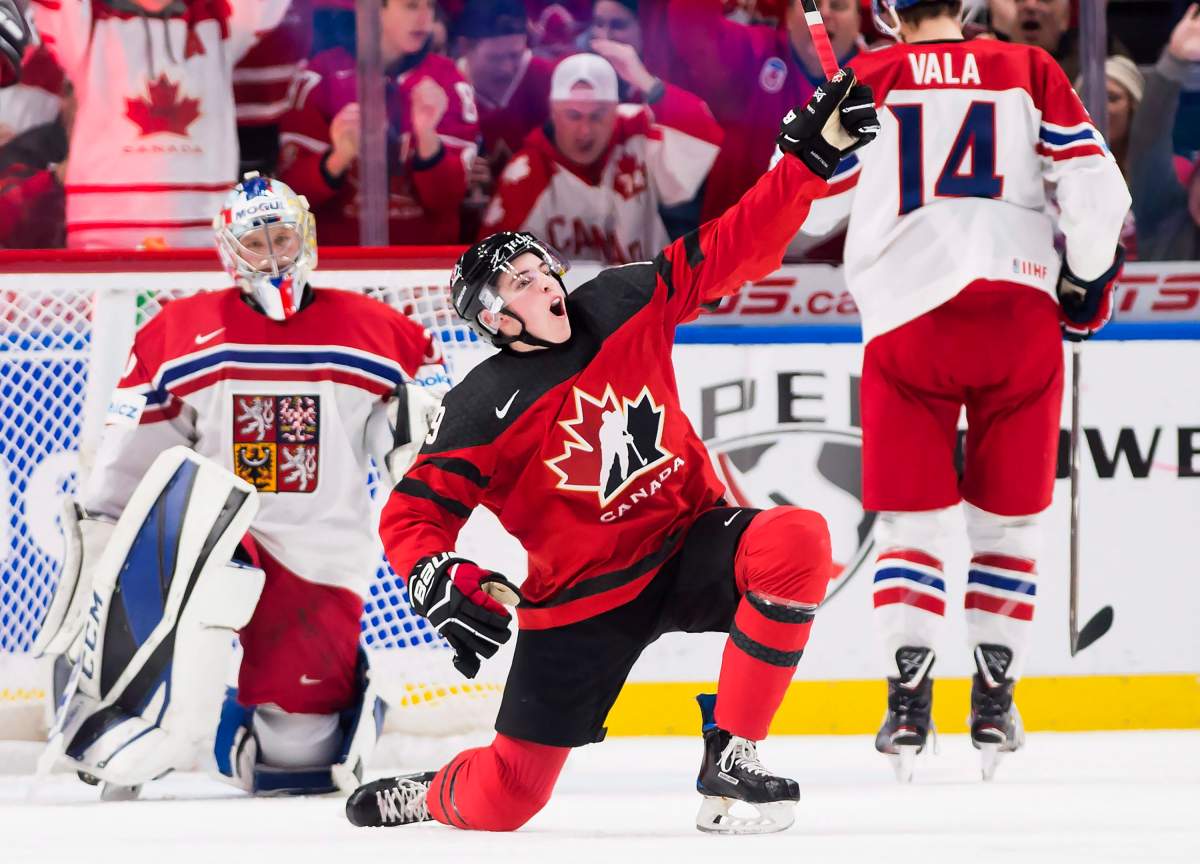 Canada forward Drake Batherson (19) celebrates after scoring against Czech Republic goaltender Josef Korenar (30) during second period semifinal IIHF World Junior Championships hockey action in Buffalo, N.Y., on Thursday, January 4, 2018. THE CANADIAN PRESS/Nathan Denette