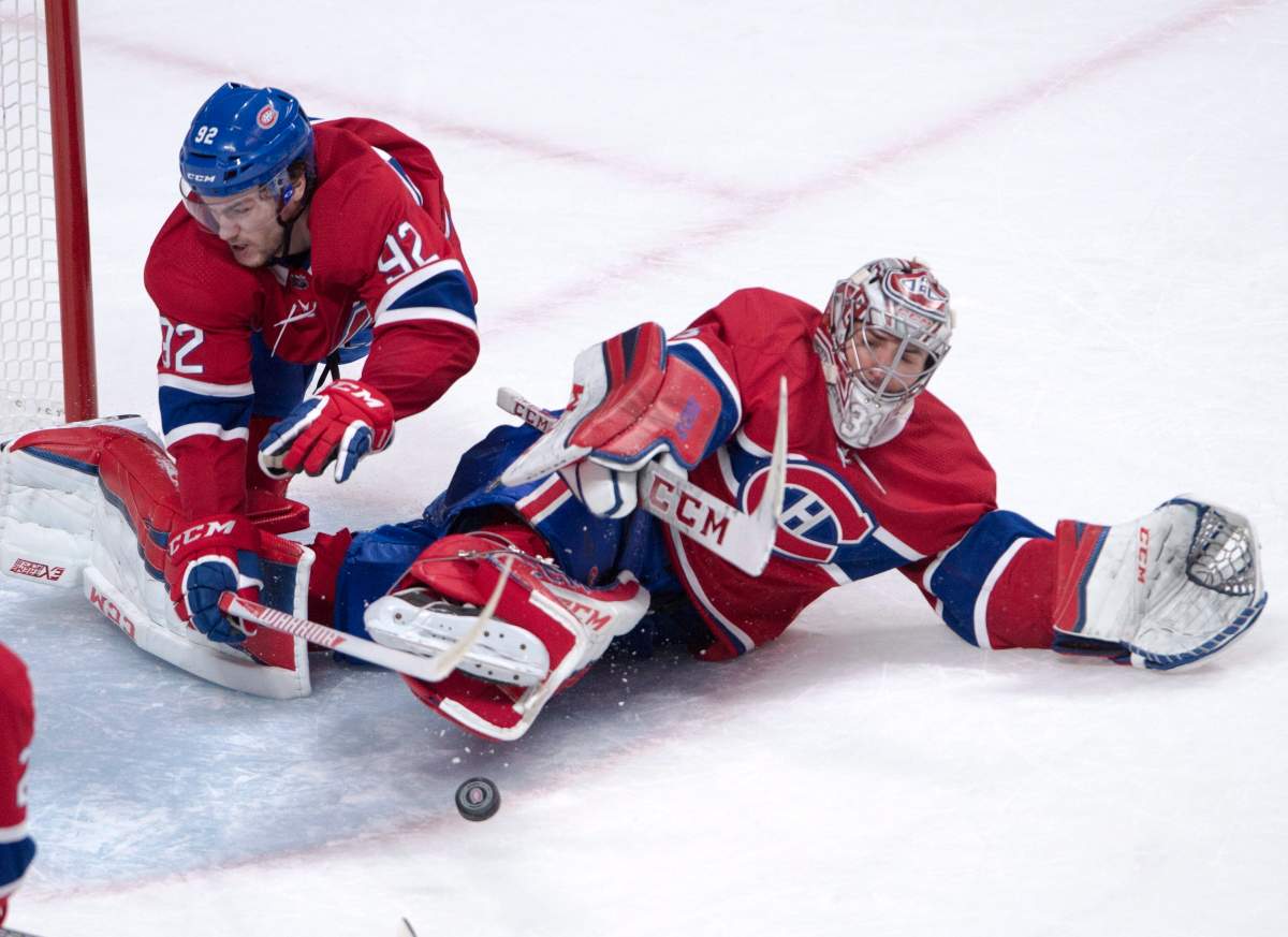 Montreal Canadiens goalie Carey Price makes a pad save as Jonathan Drouin moves in to help during overtime NHL hockey action against the Tampa Bay Lightning. Thursday, January 4, 2018.
