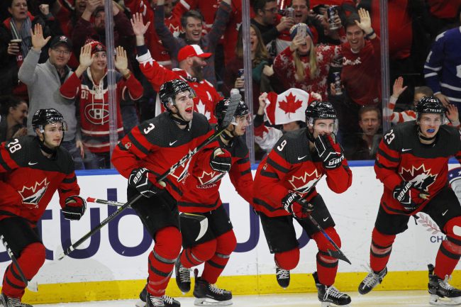 Canada celebrates a goal against Sweden during the second period of the title game of the IIHF world junior hockey championships Friday, Jan. 5, 2018, in Buffalo, N.Y.