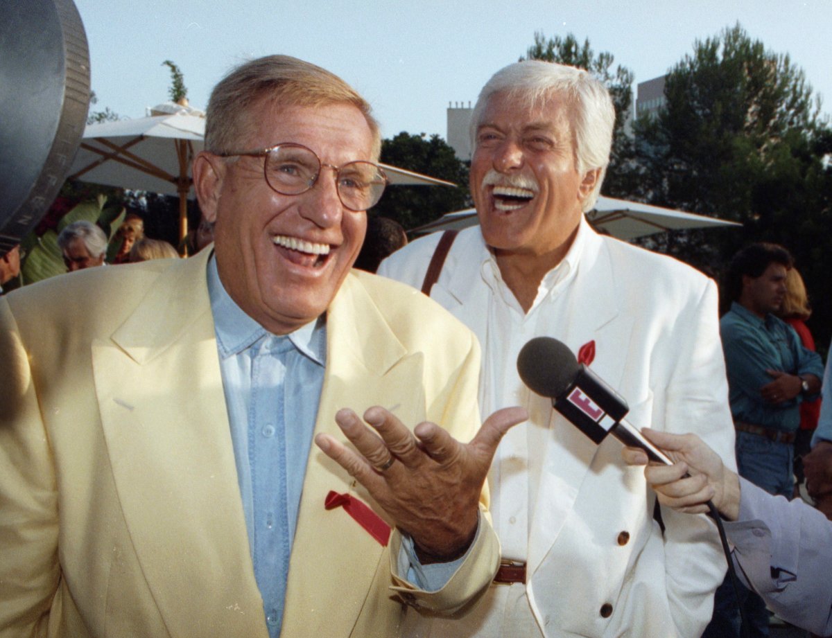 FILE - In this Aug. 25, 1992 file photo, Jerry Van Dyke, left, and his brother, Dick, laugh during a party in Los Angeles. Manager said Saturday, Jan. 6, 2018, that Jerry Van Dyke, 'Coach' star and younger brother of comedian Dick Van Dyke, has died in Arkansas at 86.  
