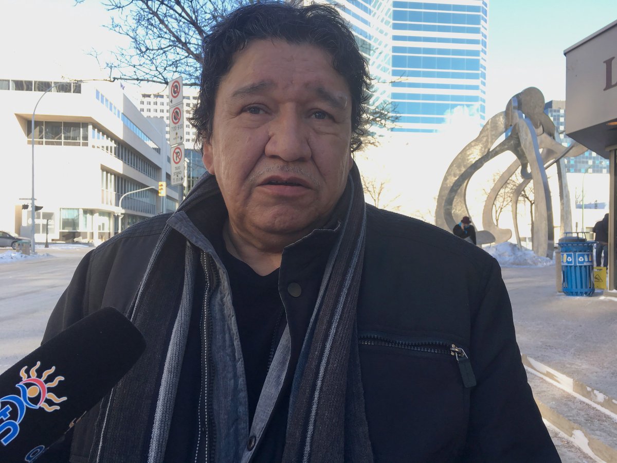 Clifford Anderson talks to reporters outside the Winnipeg courthouse Friday, Jan.12, 2018, after speaking in favour of a proposed $90-million settlement to a class-action lawsuit over flooding. Anderson, 59, says it is time for closure on a 2011 flood that forced residents of four First Nations from their homes, and which the residents say was caused by a Manitoba government water diversion project. 