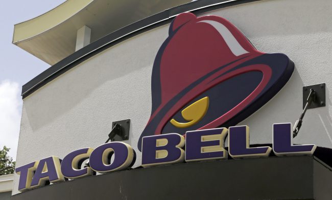 This Aug. 3, 2017, photo shows a Taco Bell sign at a restaurant in Hialeah, Fla.