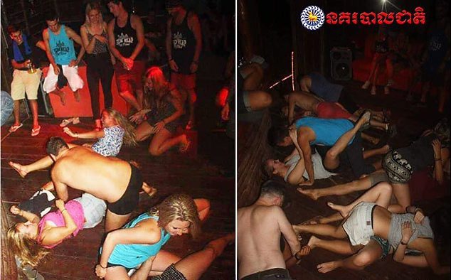 In this photo dated Jan. 25, 2018, issued by Cambodian National Police, a group of unidentified foreigners, who are accused of "dancing pornographically" at a party in Siem Reap town, near the country's famed Angkor Wat temple complex.